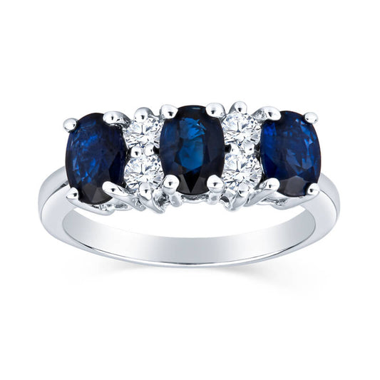 David Connolly | Luxurious Three Stone Oval Sapphire Ring With Diamond Details