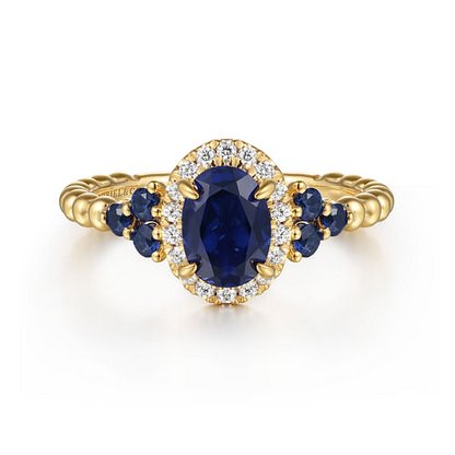 14K Yellow Gold Bujukan Diamond Halo and Oval Blue Sapphire Fashion Ring