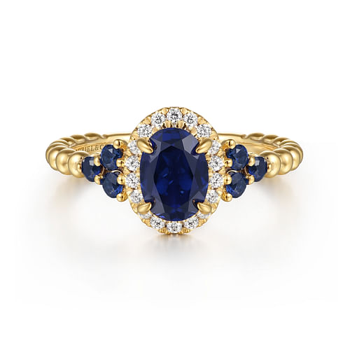 14K Yellow Gold Bujukan Diamond Halo and Oval Blue Sapphire Fashion Ring
