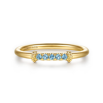 14K Yellow Gold Bujukan Blue Topaz Stackable Ring (.09 CTW)