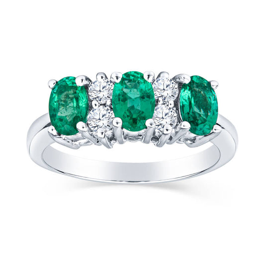 David Connolly | Luxurious Three Stone Oval Emerald Ring With Diamond Details