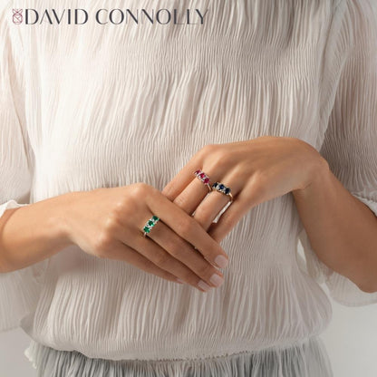 David Connolly | Luxurious Three Stone Oval Emerald Ring With Diamond Details