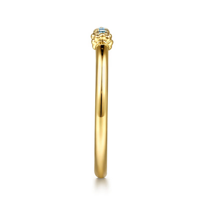 14K Yellow Gold Bujukan Blue Topaz Stackable Ring (.09 CTW)